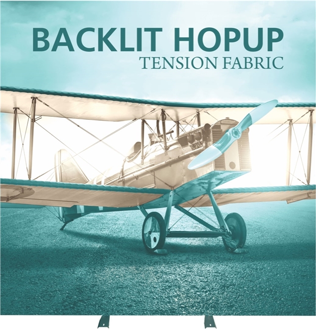 Backlit trade show display graphics on a tension fabric hop up display